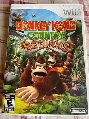 Nintendo Donkey Kong Country Returns - Green, Red, Brown Cover